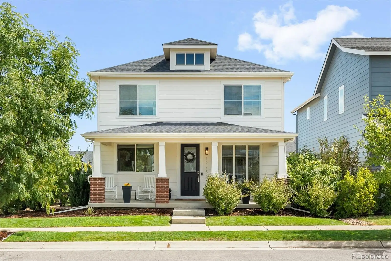 Front exterior: a two-story home with a full-width front porch