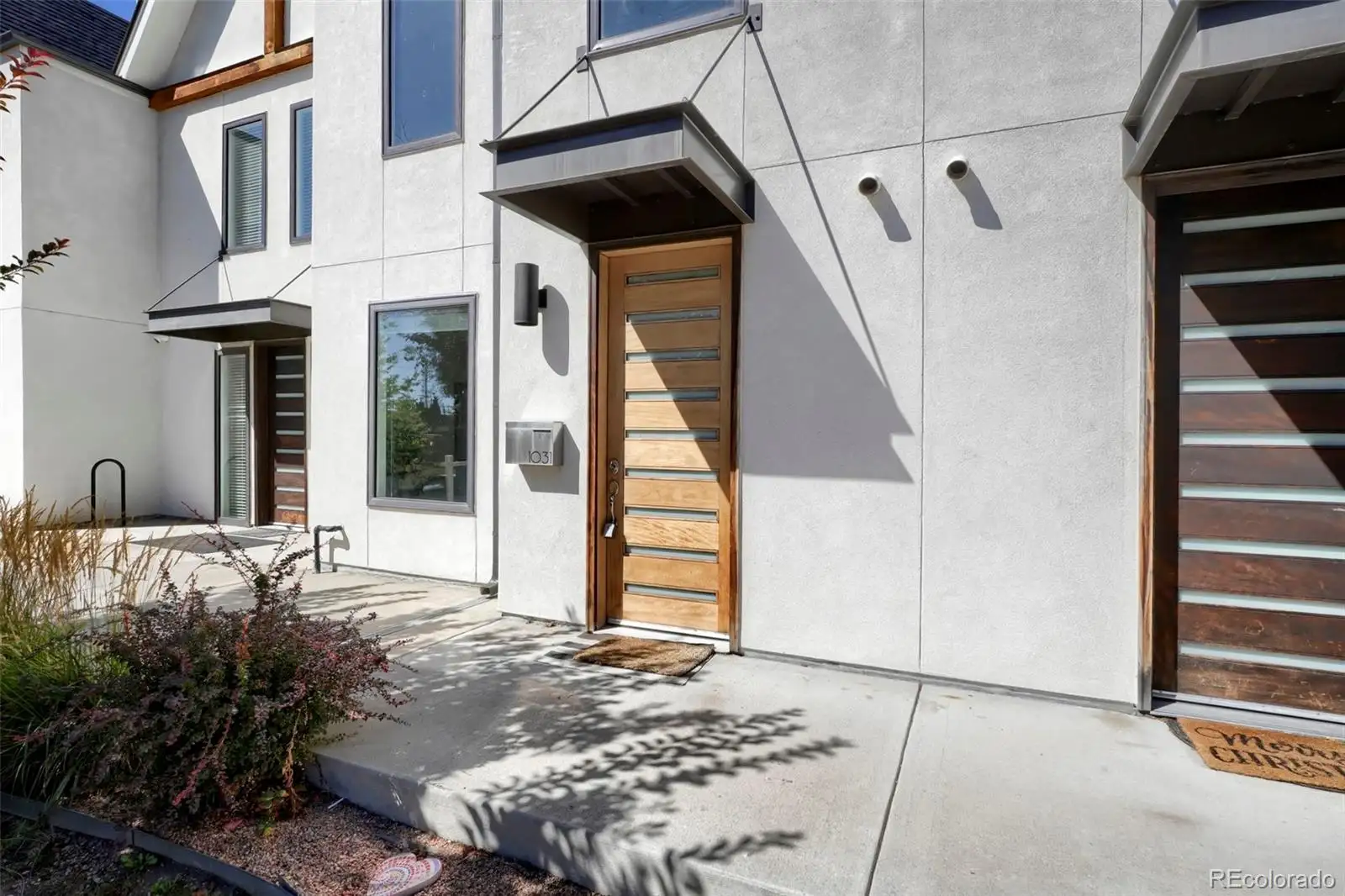 Entry with a wood-slat detail