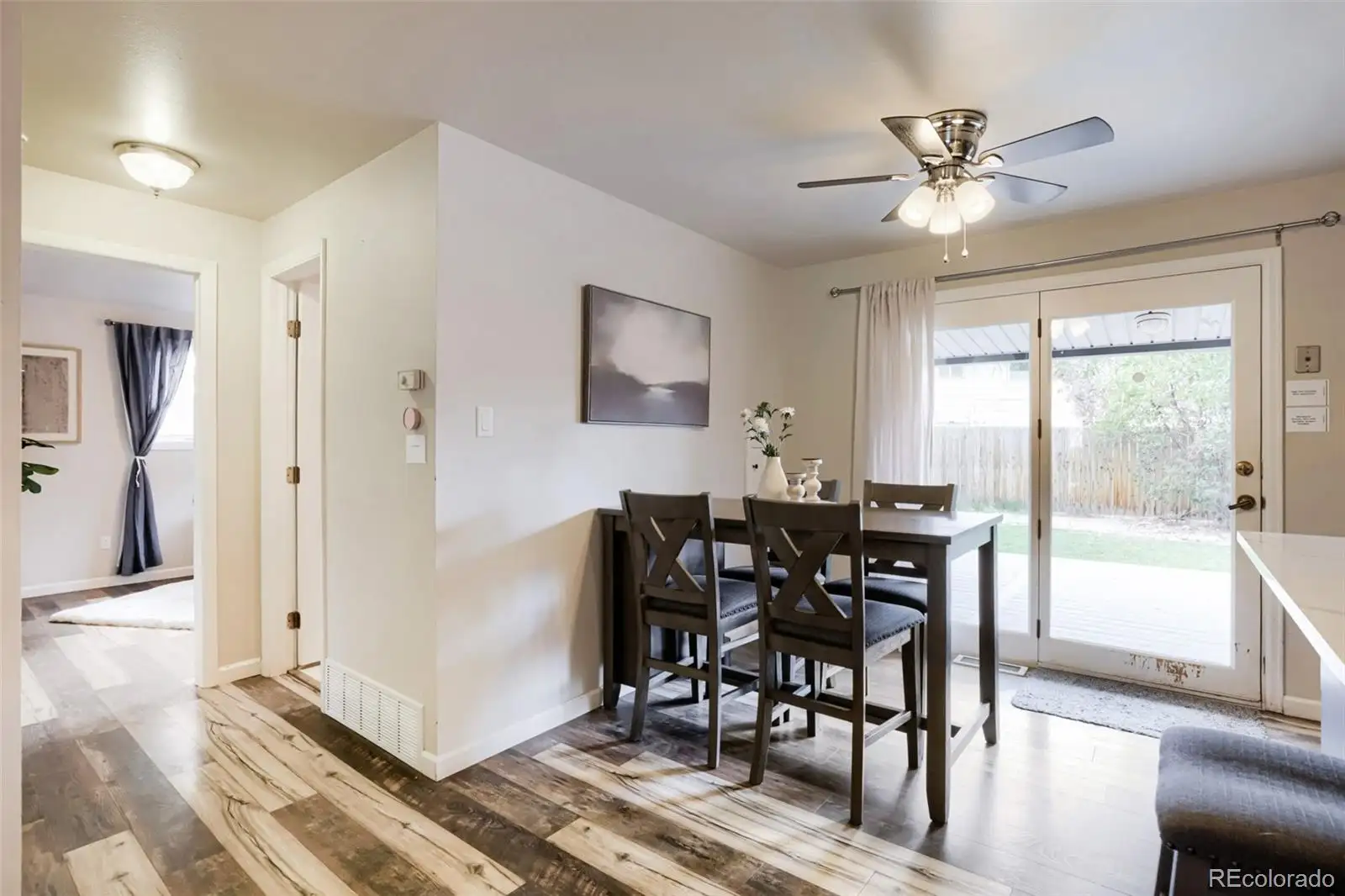 Dining area with a sliding door to the covered patio