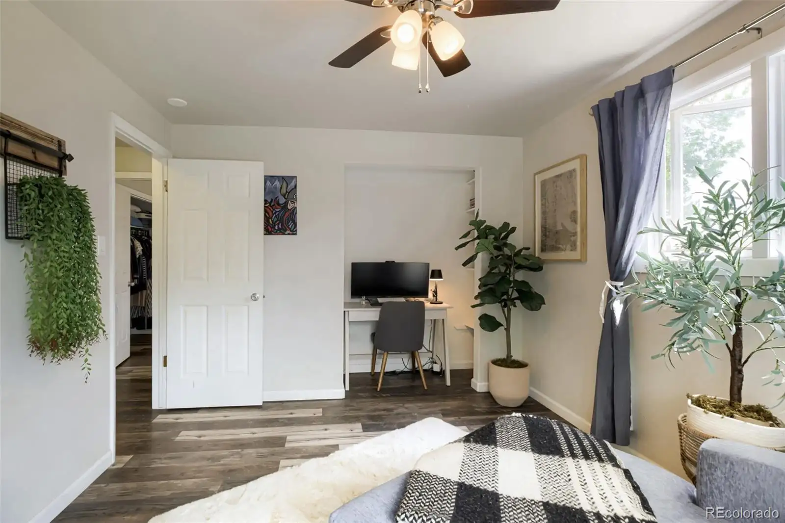 Main-level bedroom with a desk nook