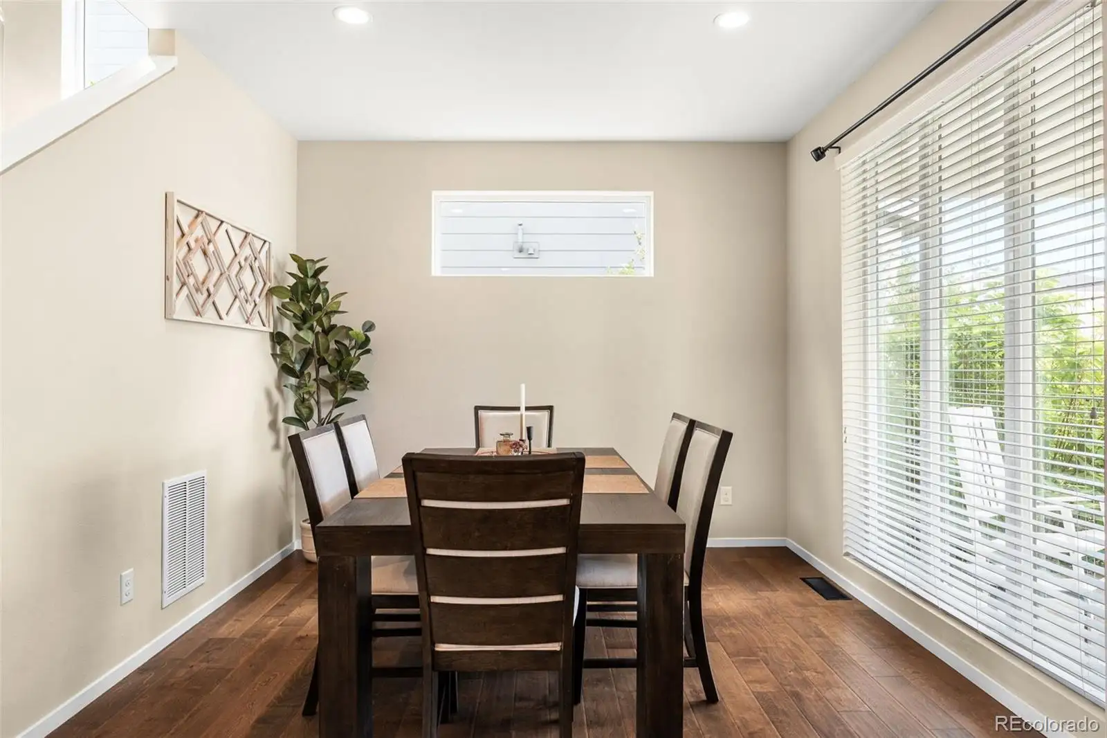 Dining area with a door to the backyard
