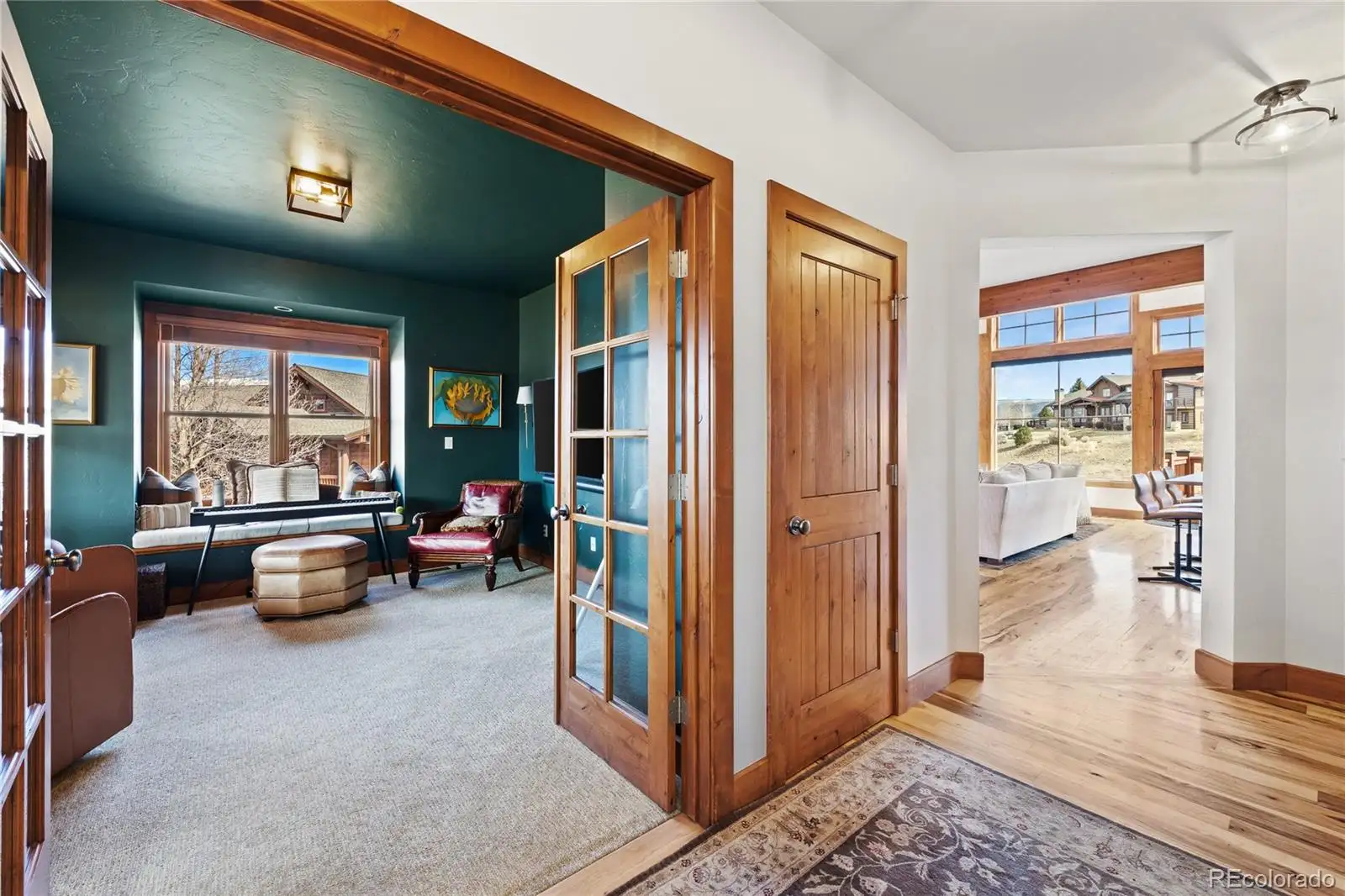 Den with French doors off the main hall