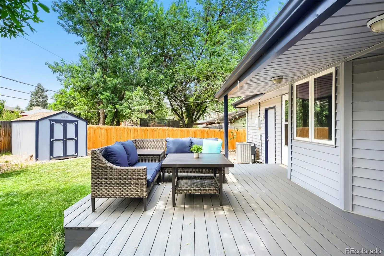 Deck with outdoor seating and the storage shed beyond