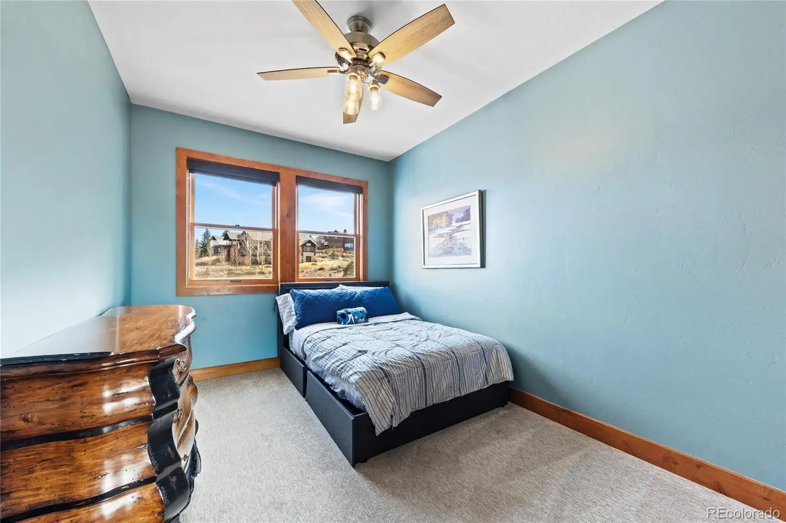 Bedroom with pale blue walls